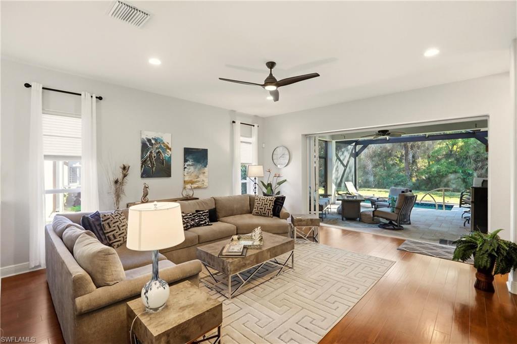 20441 Rookery Drive Estero, FL 33928 - Photo 5 of 41 a living room with furniture and a large window