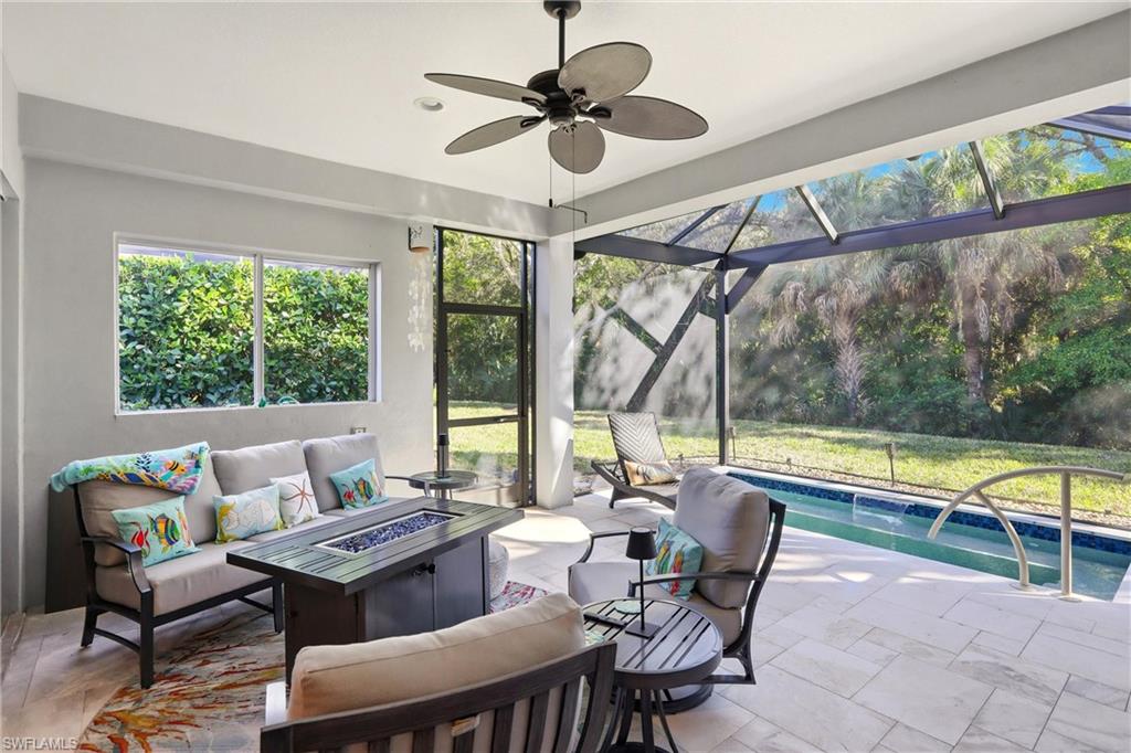 20441 Rookery Drive Estero, FL 33928 - Photo 6 of 41 a living room with furniture and a large window