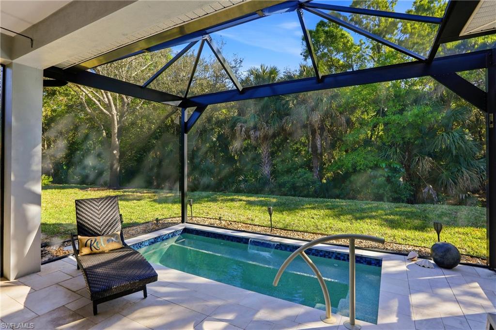 20441 Rookery Drive Estero, FL 33928 - Photo 7 of 41 a view of swimming pool with seating area and couch in front of it