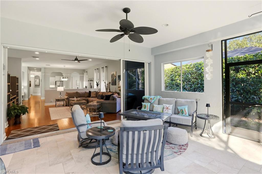 20441 Rookery Drive Estero, FL 33928 - Photo 8 of 41 a living room with furniture and a large window