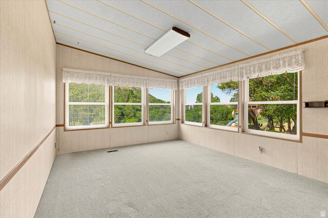 2405 Canyon Road Smithfield, UT 84335 - Photo 12 of 57 Room featuring light-toned carpeting and multiple windows