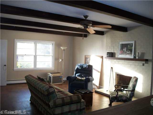 504 Ragsdale Road Jamestown, NC 27282 - Photo 5 of 12 Den/Family/Great Room. Den