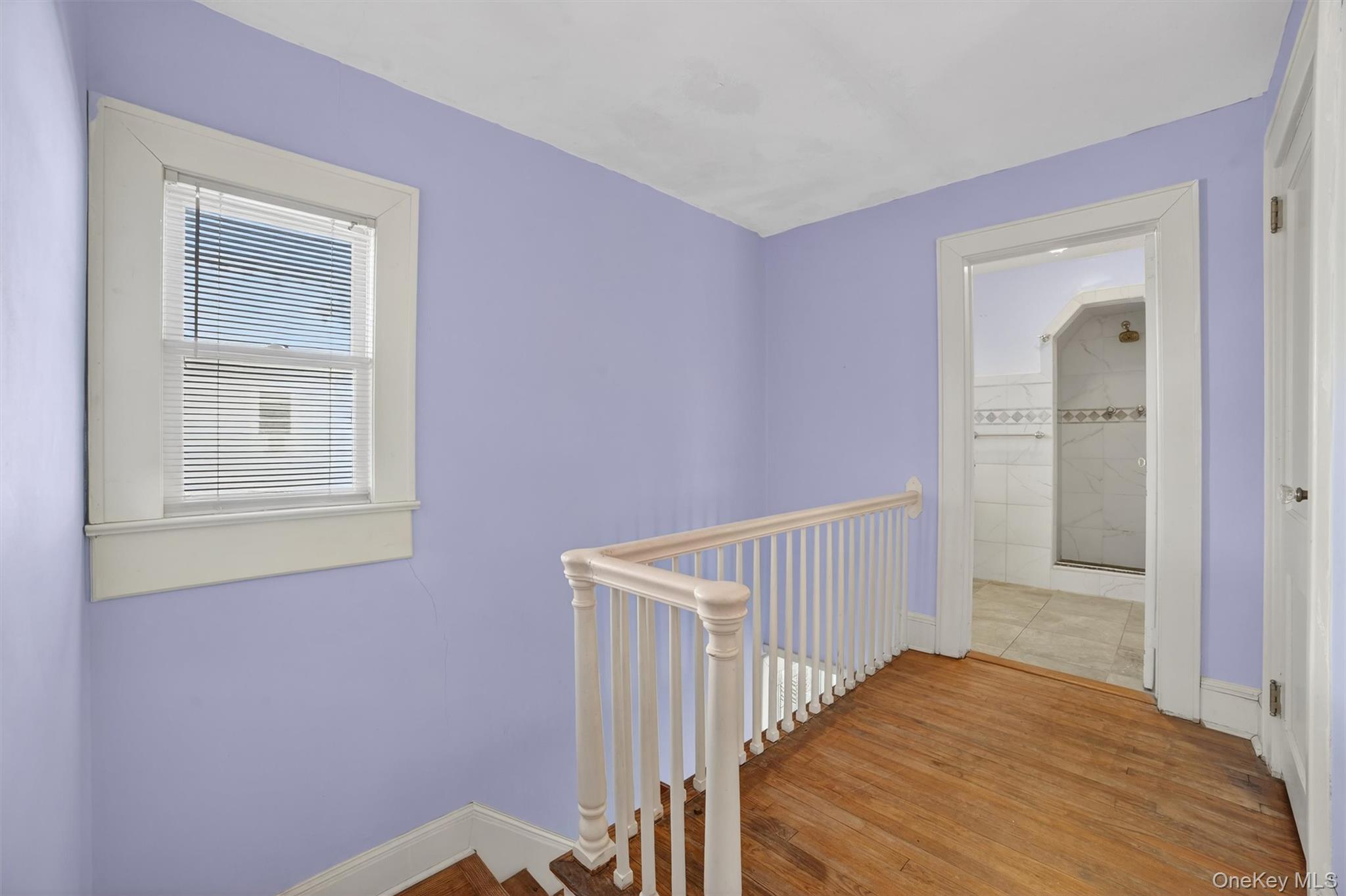 530 Dyckman Street Peekskill, NY 10566 - Photo 18 of 34 Upper level hallway. Hardwood flooring accents the two main living levels.