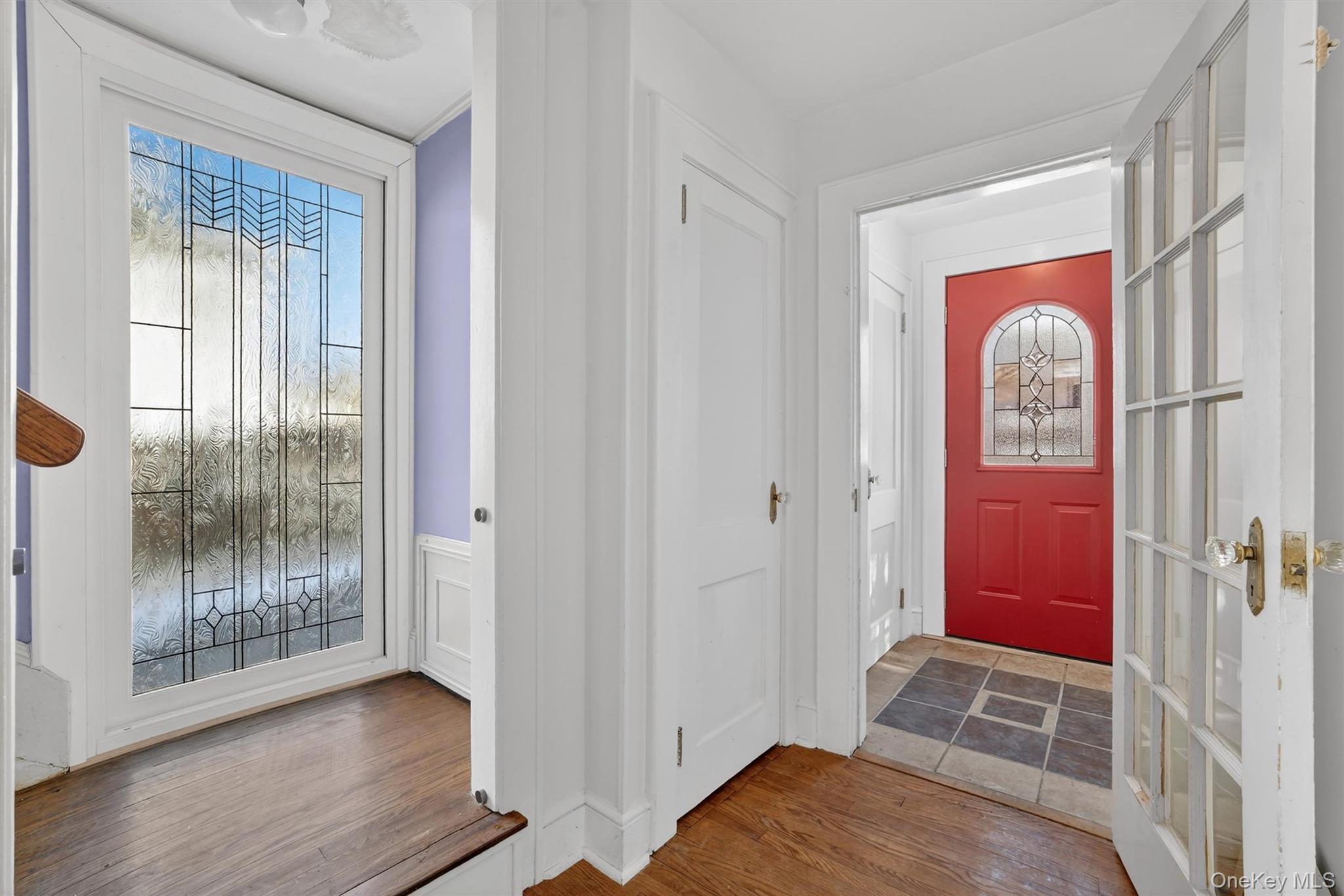 530 Dyckman Street Peekskill, NY 10566 - Photo 2 of 34 Entry foyer with coat closet, tile floor and powder room. French door into the main level foyer with closet.