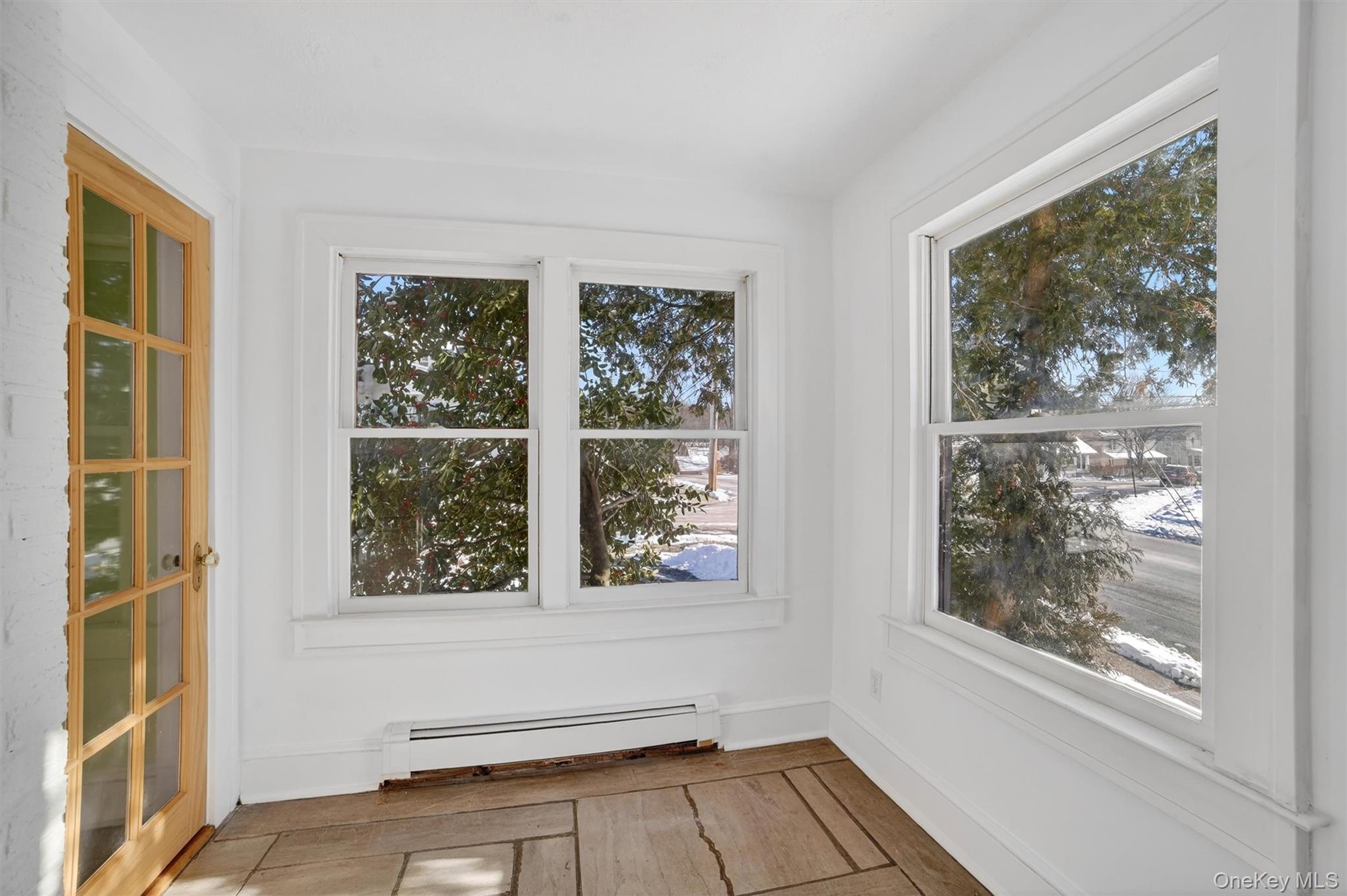 530 Dyckman Street Peekskill, NY 10566 - Photo 6 of 34 Sun room off living room, makes for a perfect sitting room or home office.