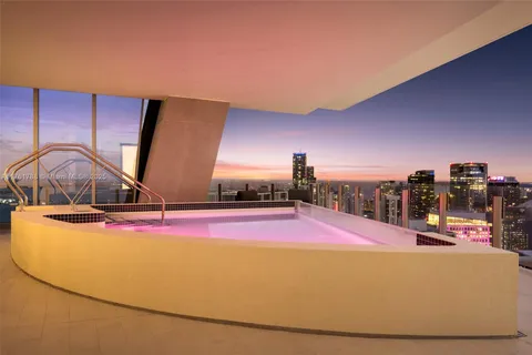 a view of a swimming pool and an outdoor space