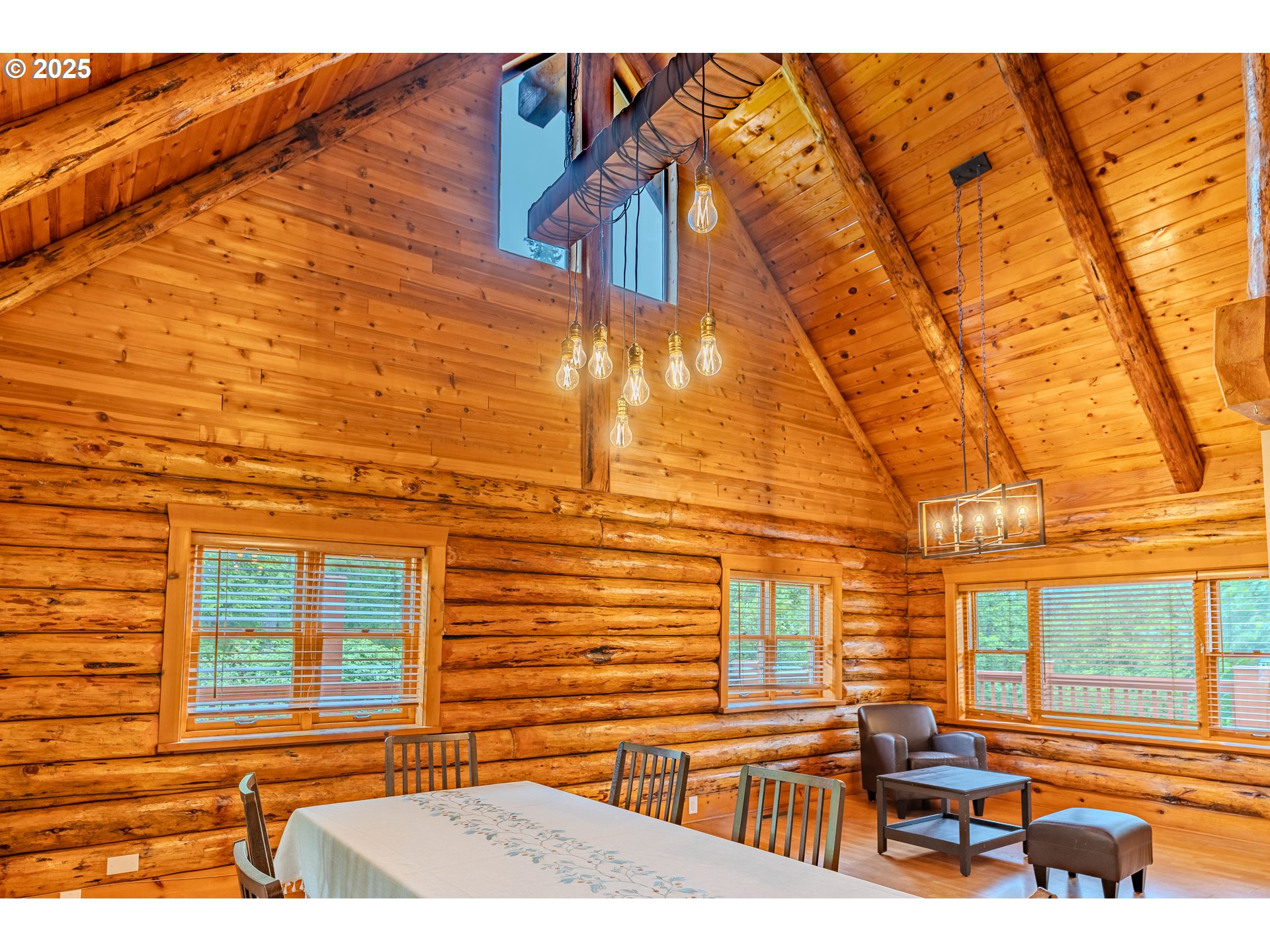 43144 Southeast Deverell Road Corbett, OR 97019 - Photo 11 of 48 a backyard of a house with seating space