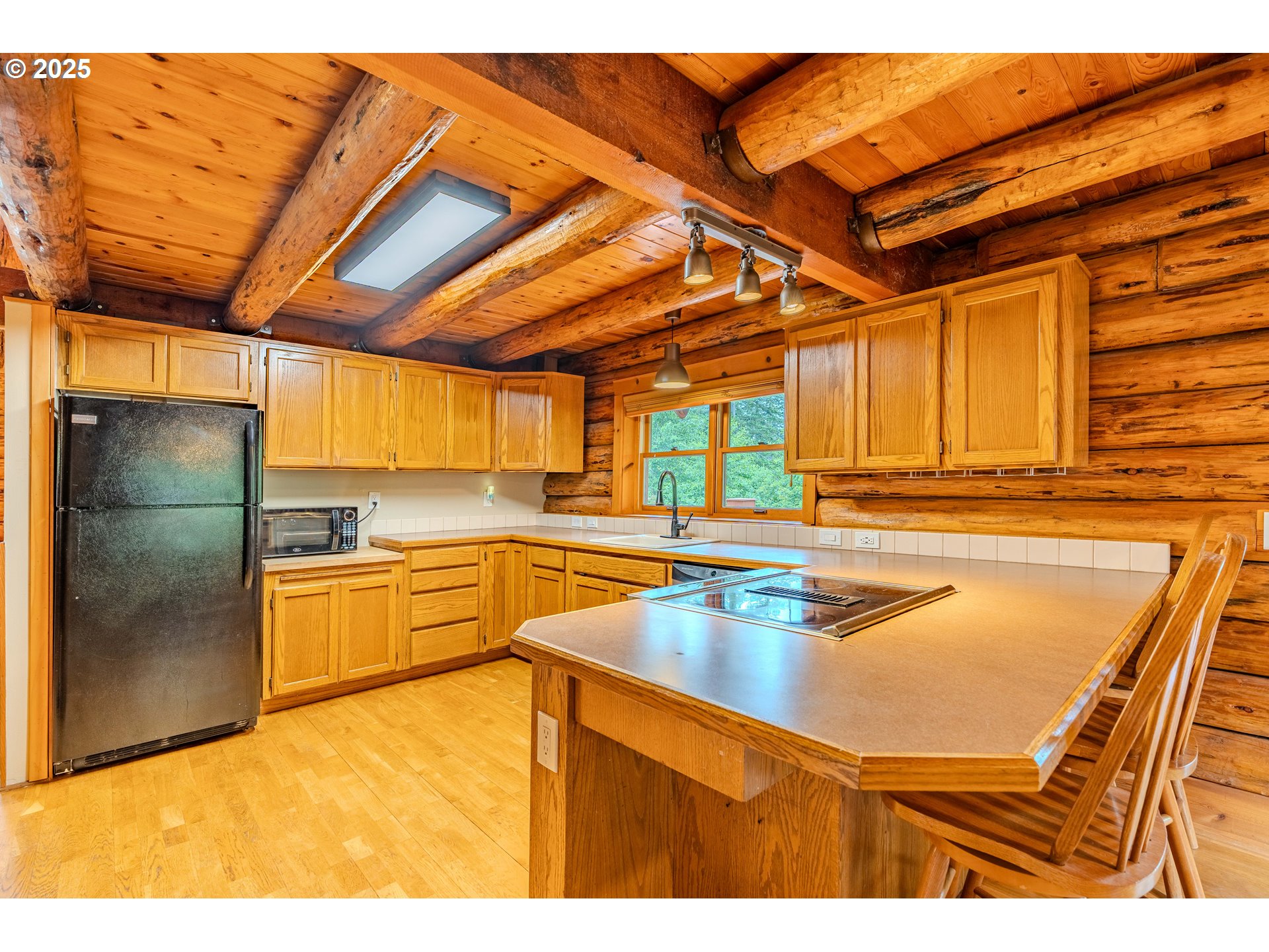 43144 Southeast Deverell Road Corbett, OR 97019 - Photo 13 of 48 a kitchen with stainless steel appliances granite countertop a sink and cabinets