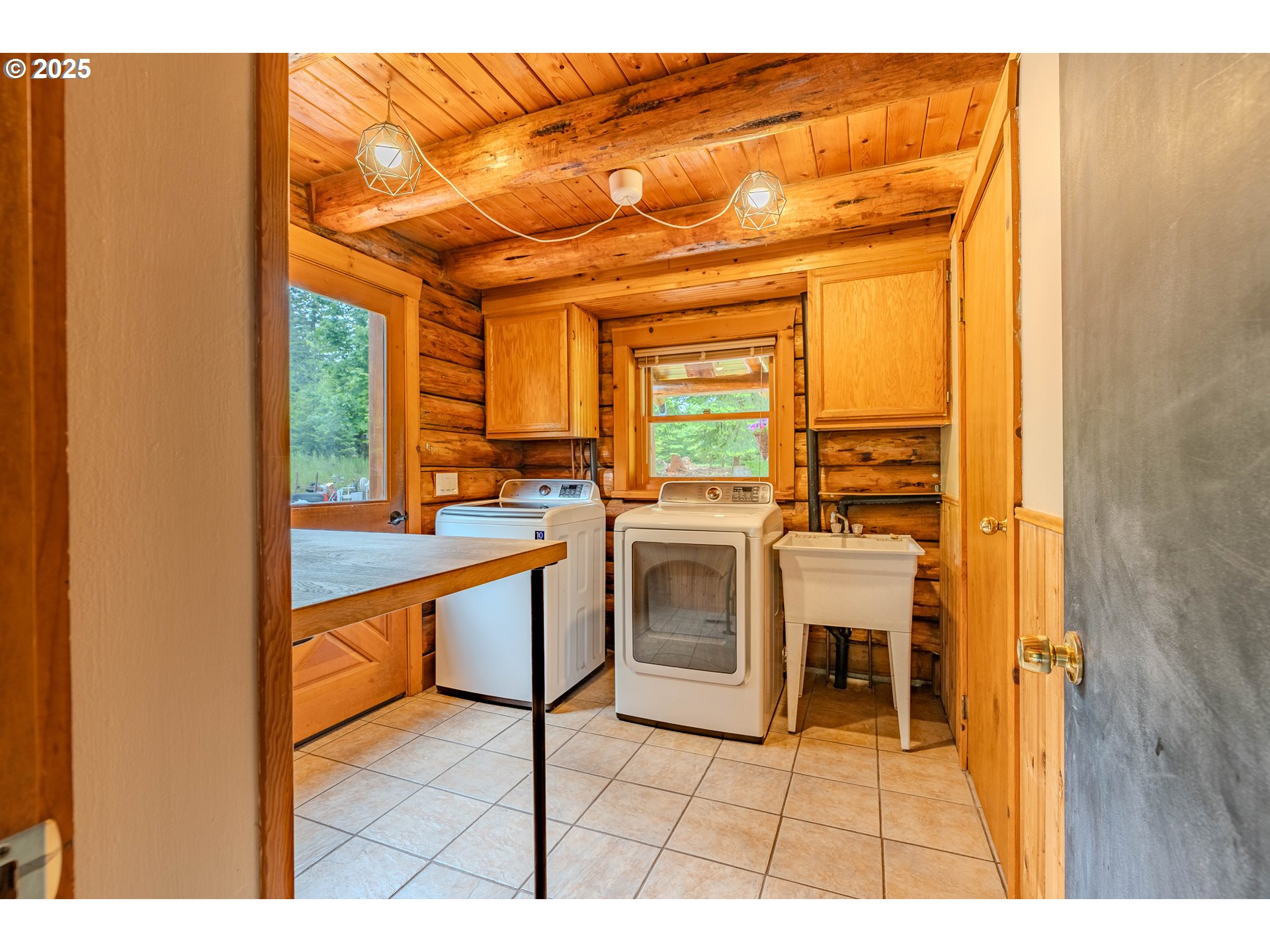 43144 Southeast Deverell Road Corbett, OR 97019 - Photo 16 of 48 a open kitchen with a sink cabinets and appliances