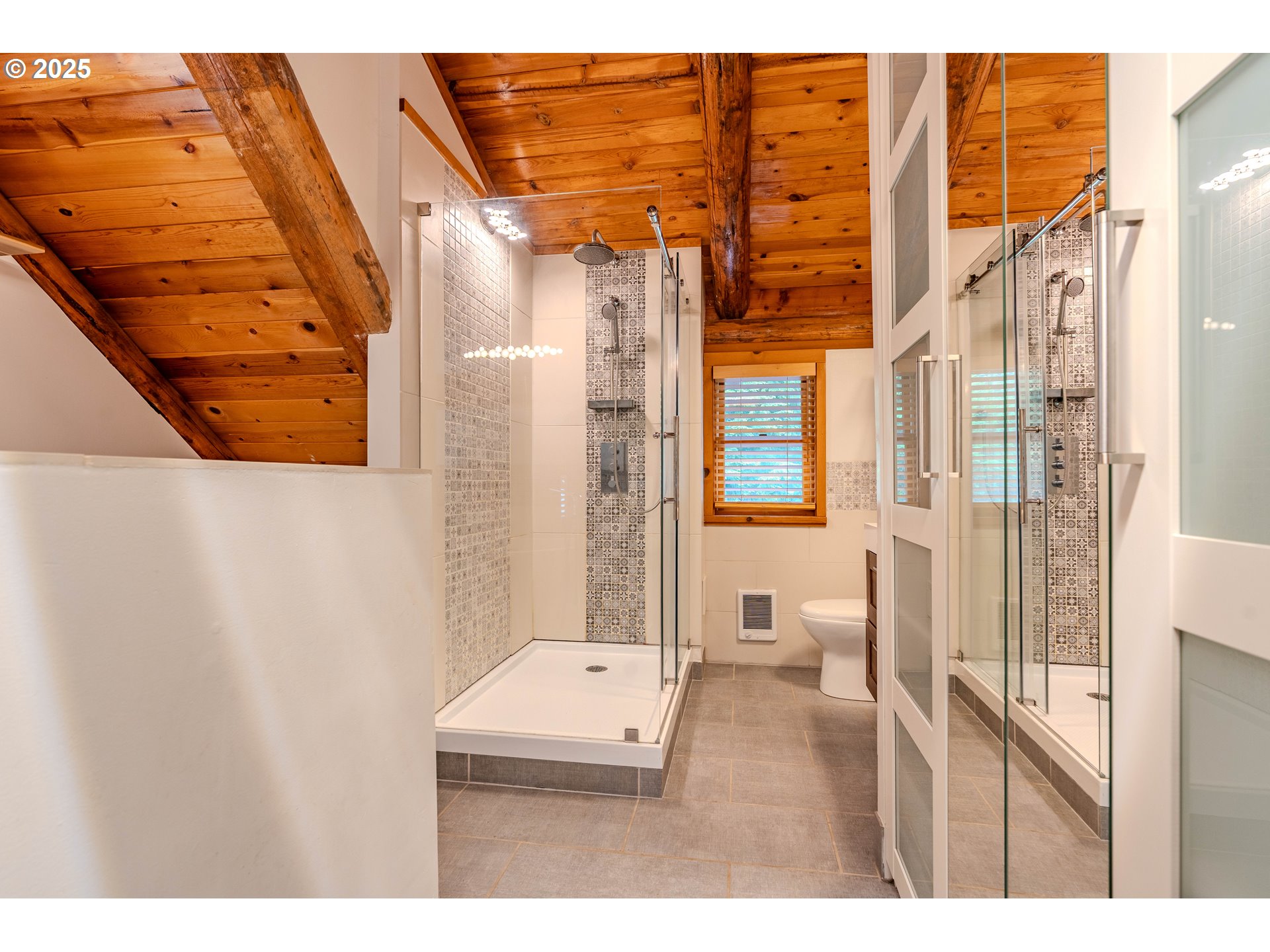 43144 Southeast Deverell Road Corbett, OR 97019 - Photo 20 of 48 a bathroom with a toilet a sink and shower