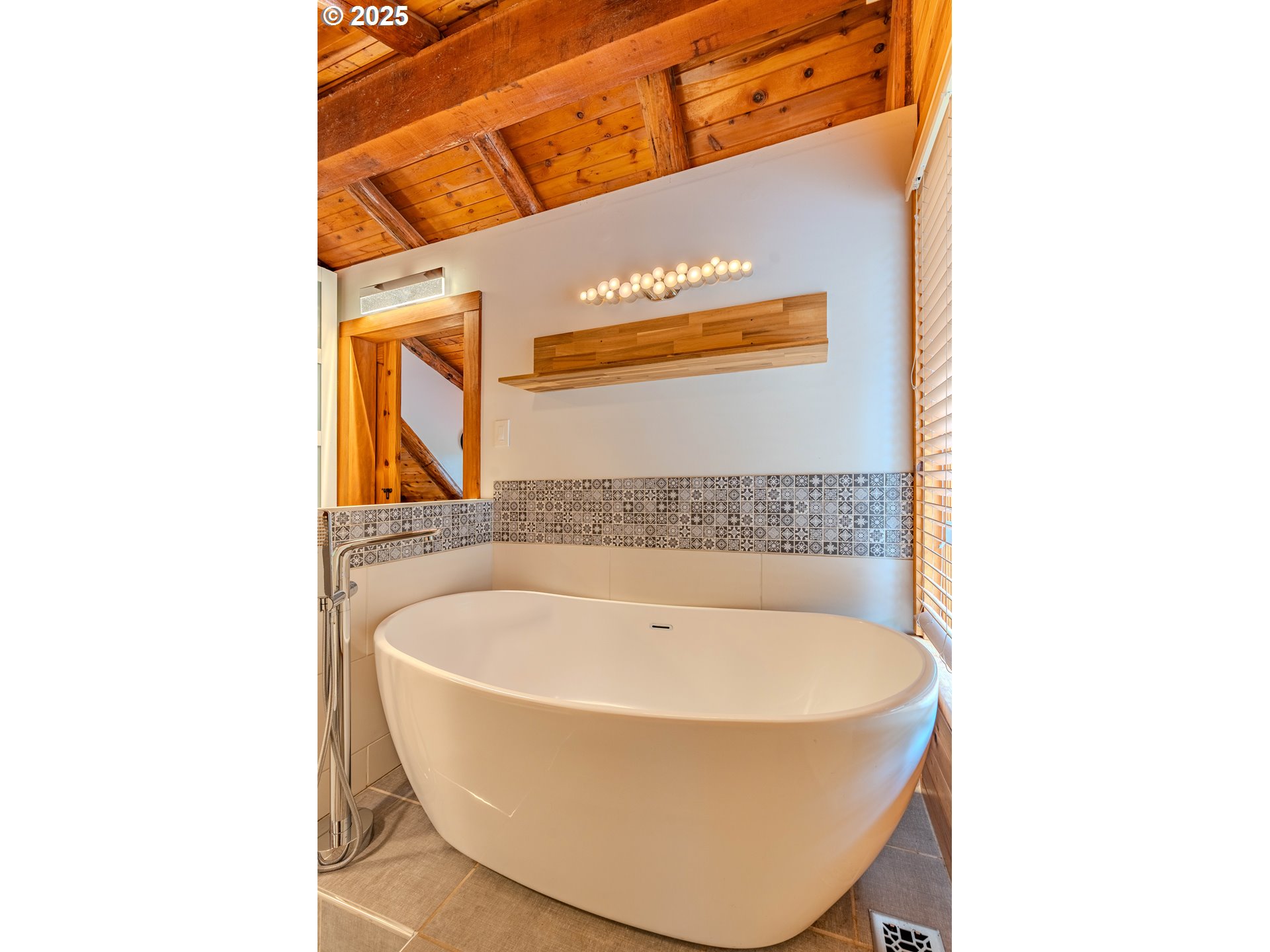 43144 Southeast Deverell Road Corbett, OR 97019 - Photo 22 of 48 a bathroom with a bathtub and shower