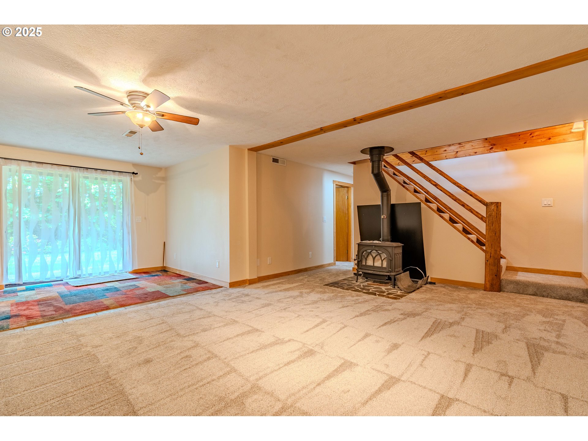 43144 Southeast Deverell Road Corbett, OR 97019 - Photo 24 of 48 a view of a livingroom with a staircase