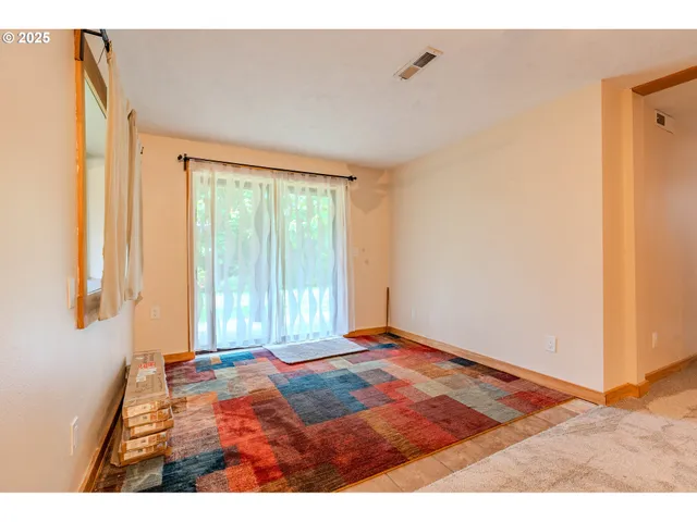 a view of a room with an empty room