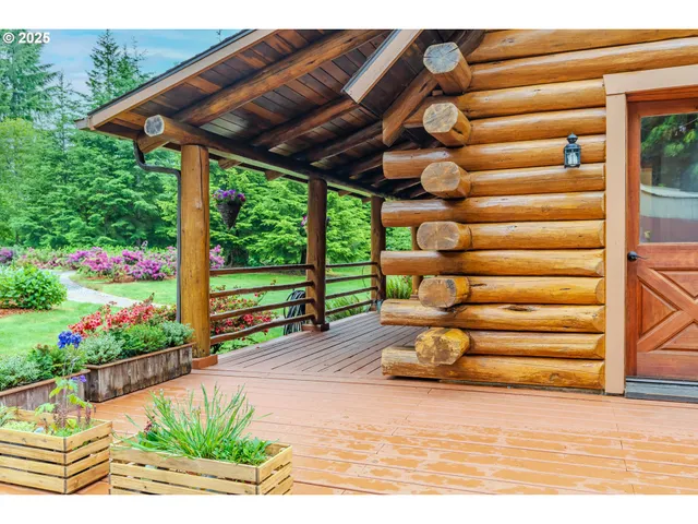 a view of a porch with furniture and yard