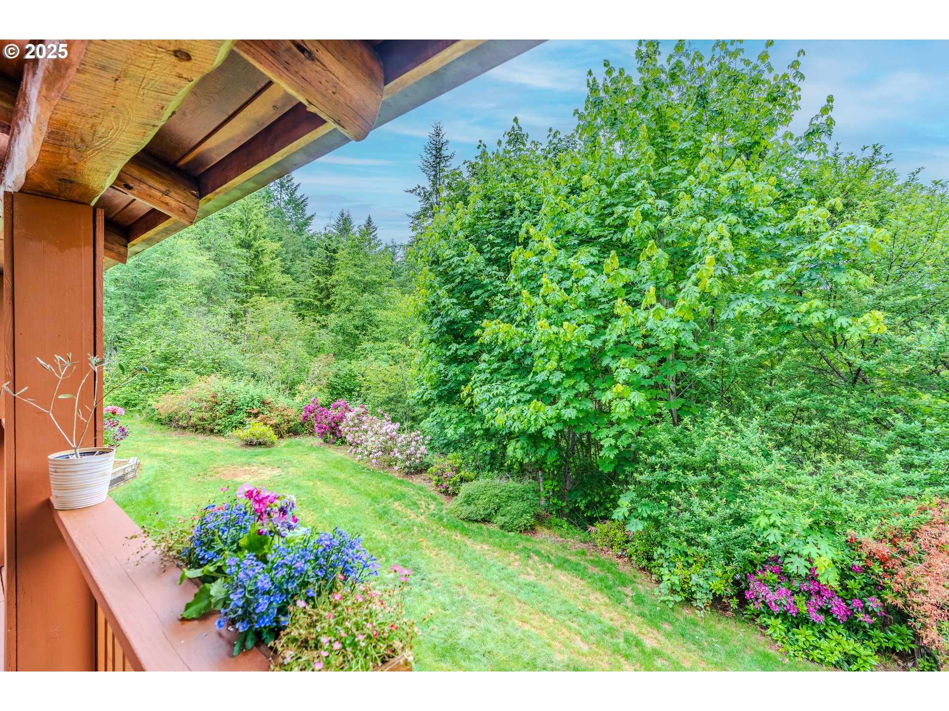 43144 Southeast Deverell Road Corbett, OR 97019 - Photo 32 of 48 a view of a flower in a garden