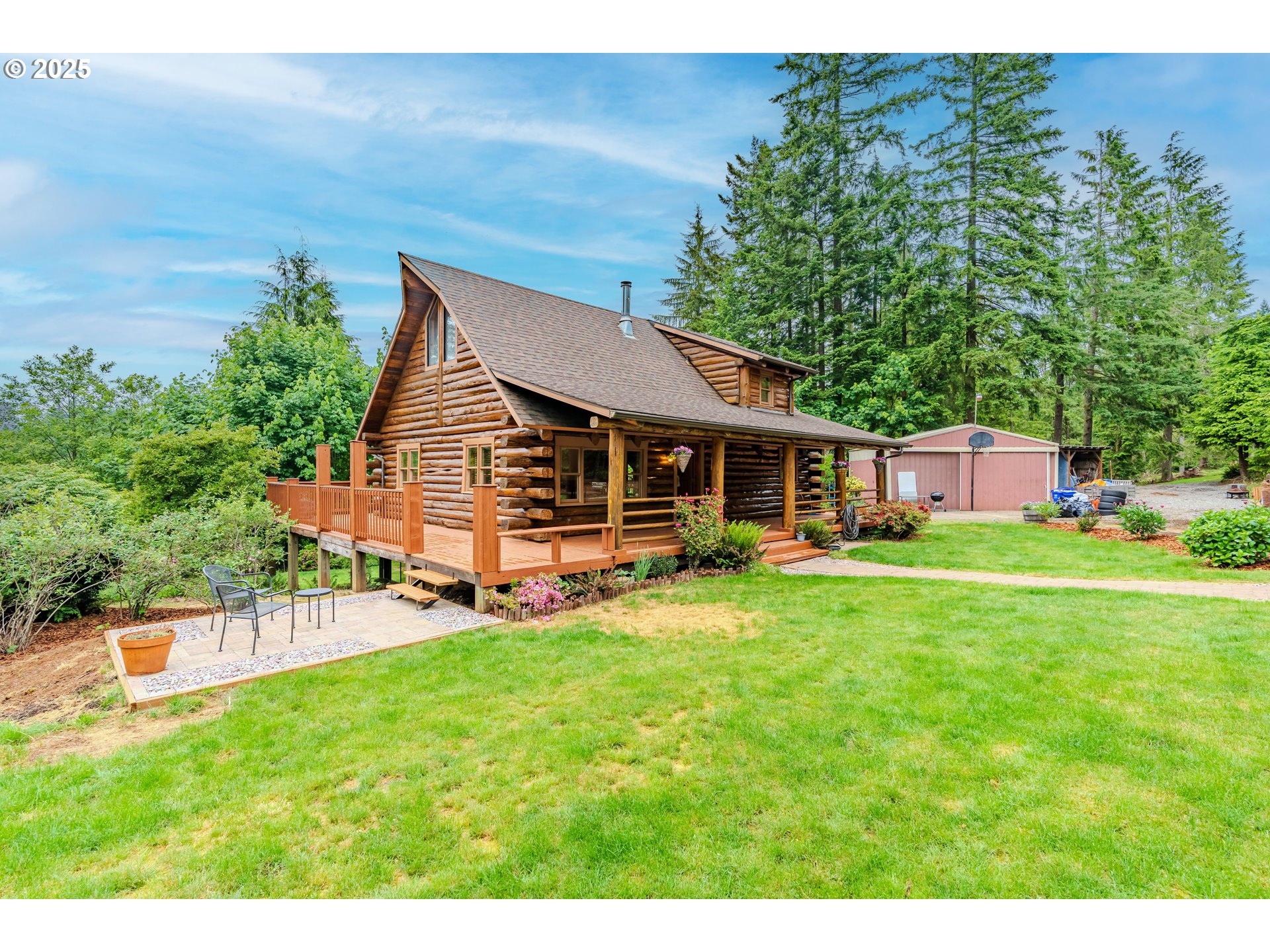 43144 Southeast Deverell Road Corbett, OR 97019 - Photo 37 of 48 a front view of a house with yard porch and furniture