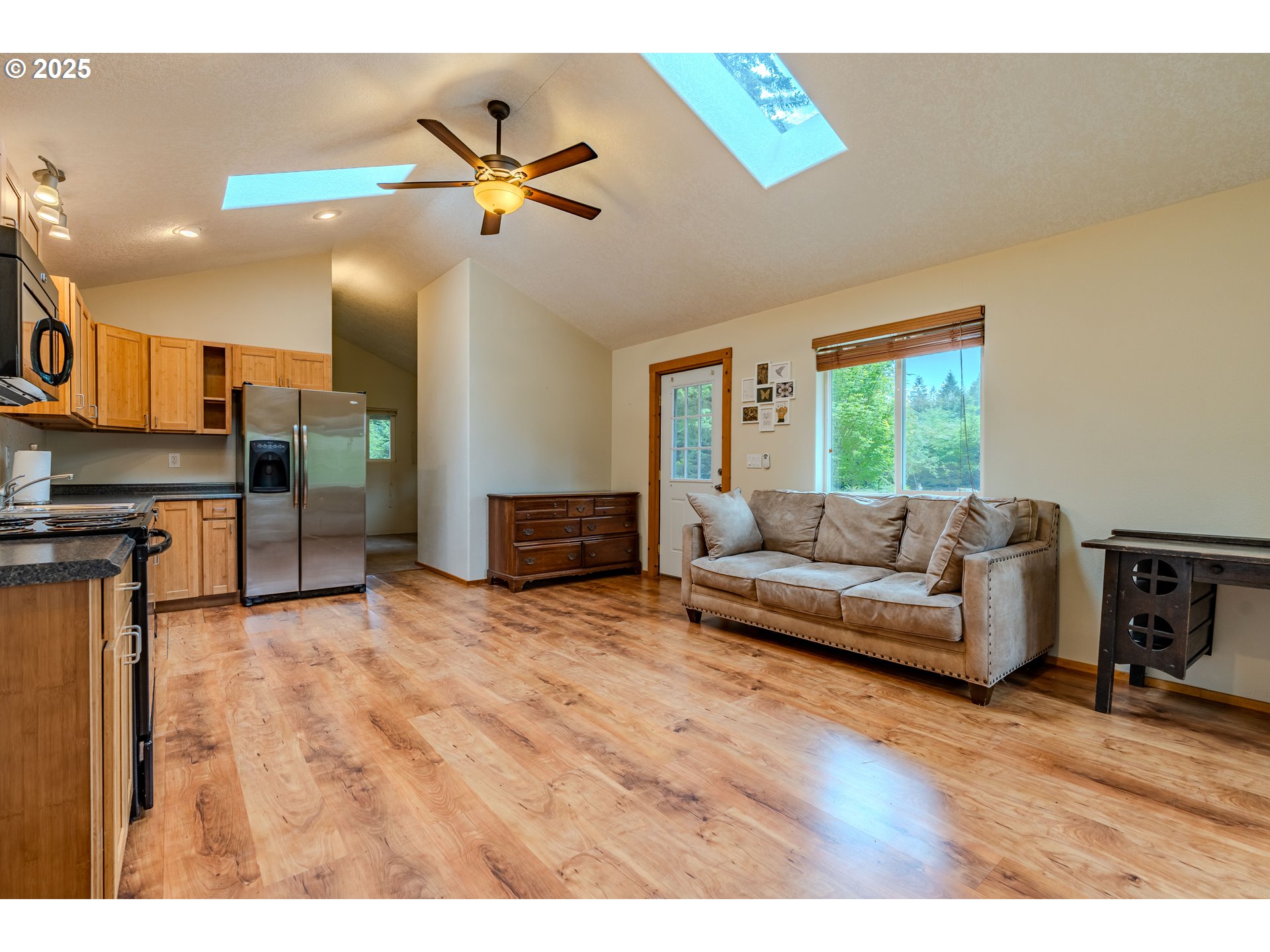 43144 Southeast Deverell Road Corbett, OR 97019 - Photo 40 of 48 a living room with furniture and a wooden floor