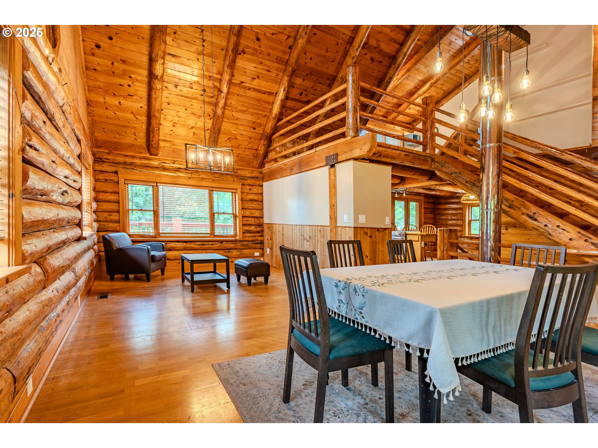 43144 Southeast Deverell Road Corbett, OR 97019 - Photo 4 of 48 a dining room with furniture and a large window