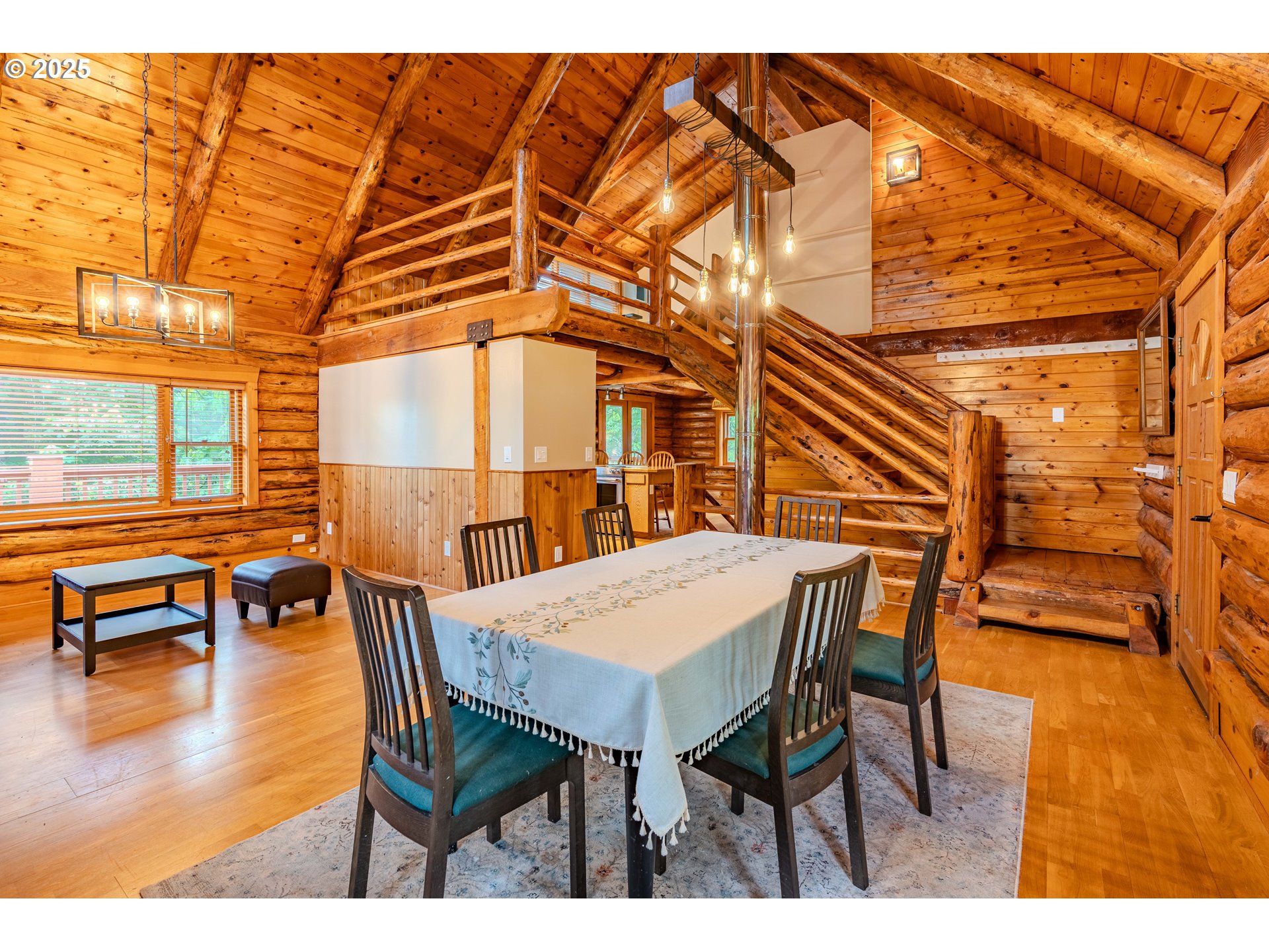 43144 Southeast Deverell Road Corbett, OR 97019 - Photo 5 of 48 a view of a patio with a table and chairs