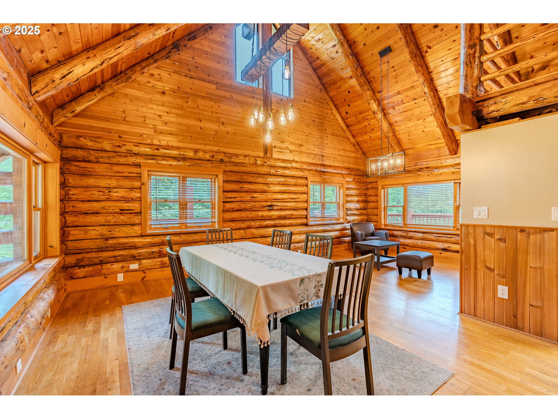 43144 Southeast Deverell Road Corbett, OR 97019 - Photo 7 of 48 a dining room with furniture and wooden floor