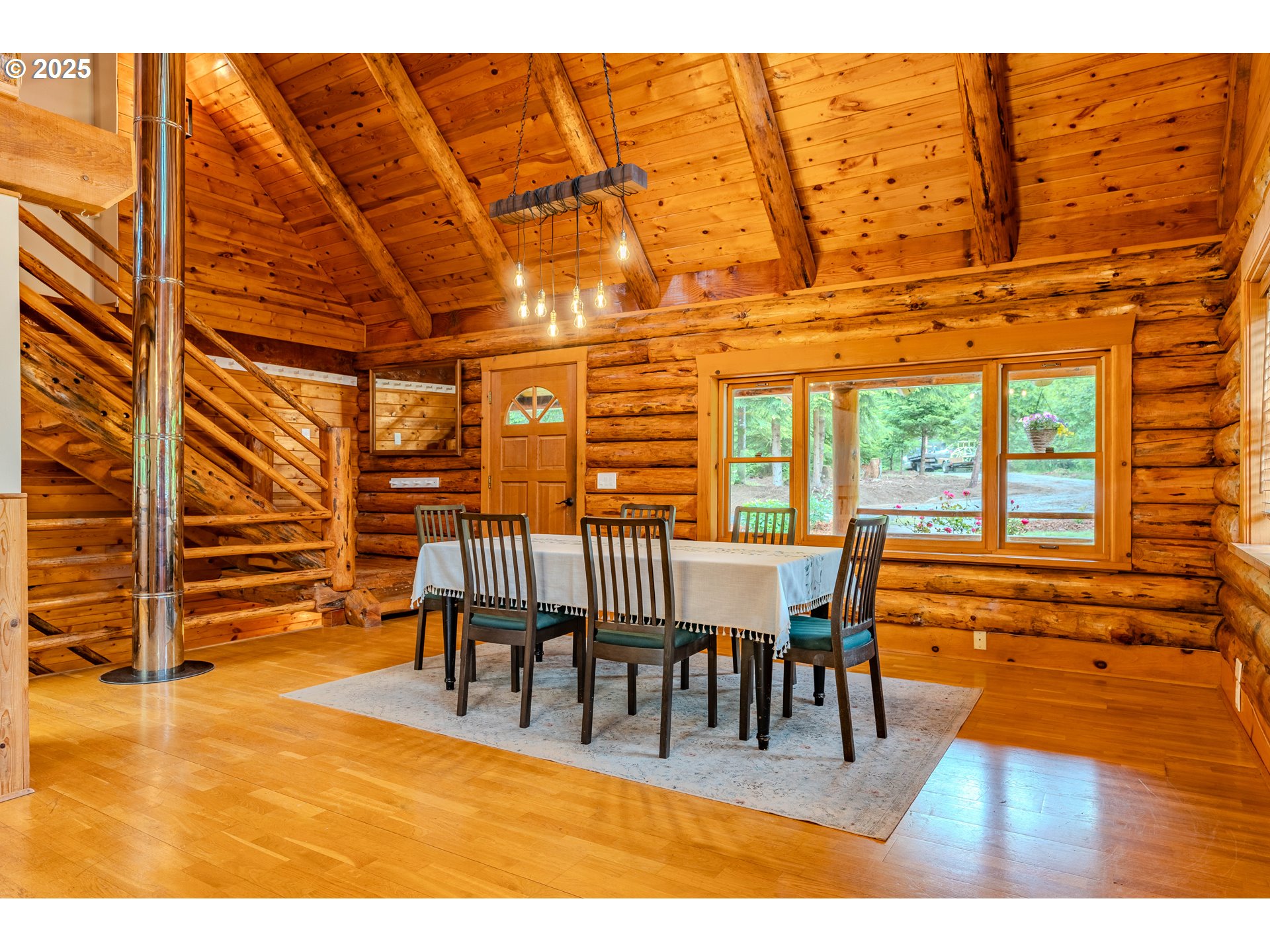 43144 Southeast Deverell Road Corbett, OR 97019 - Photo 9 of 48 a view of a patio with table and chairs