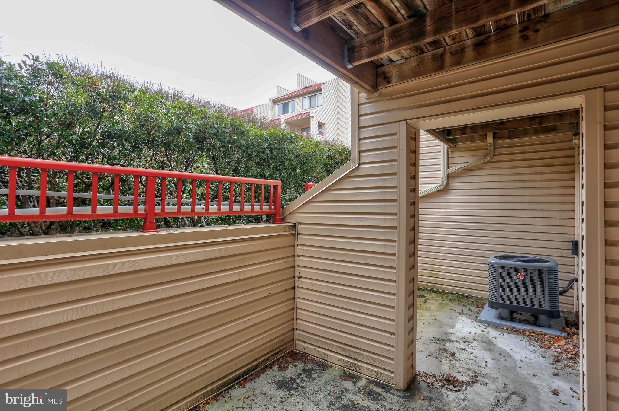 8018 Valley Manor Road, Unit 1A Owings Mills, MD 21117 - Photo 18 of 24 a view of a balcony with lots of wooden stairs