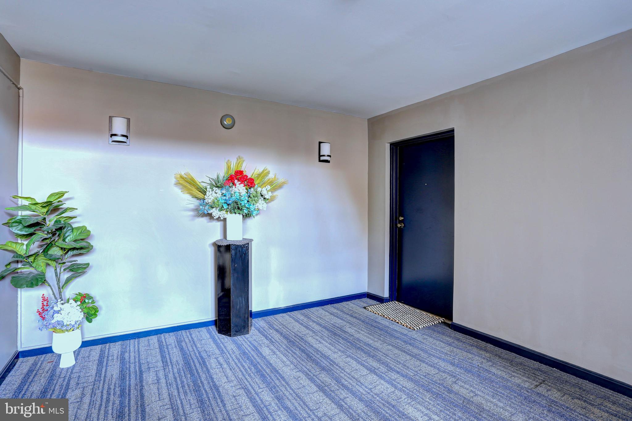 8018 Valley Manor Road, Unit 1A Owings Mills, MD 21117 - Photo 20 of 24 a view of a entryway with wooden floor