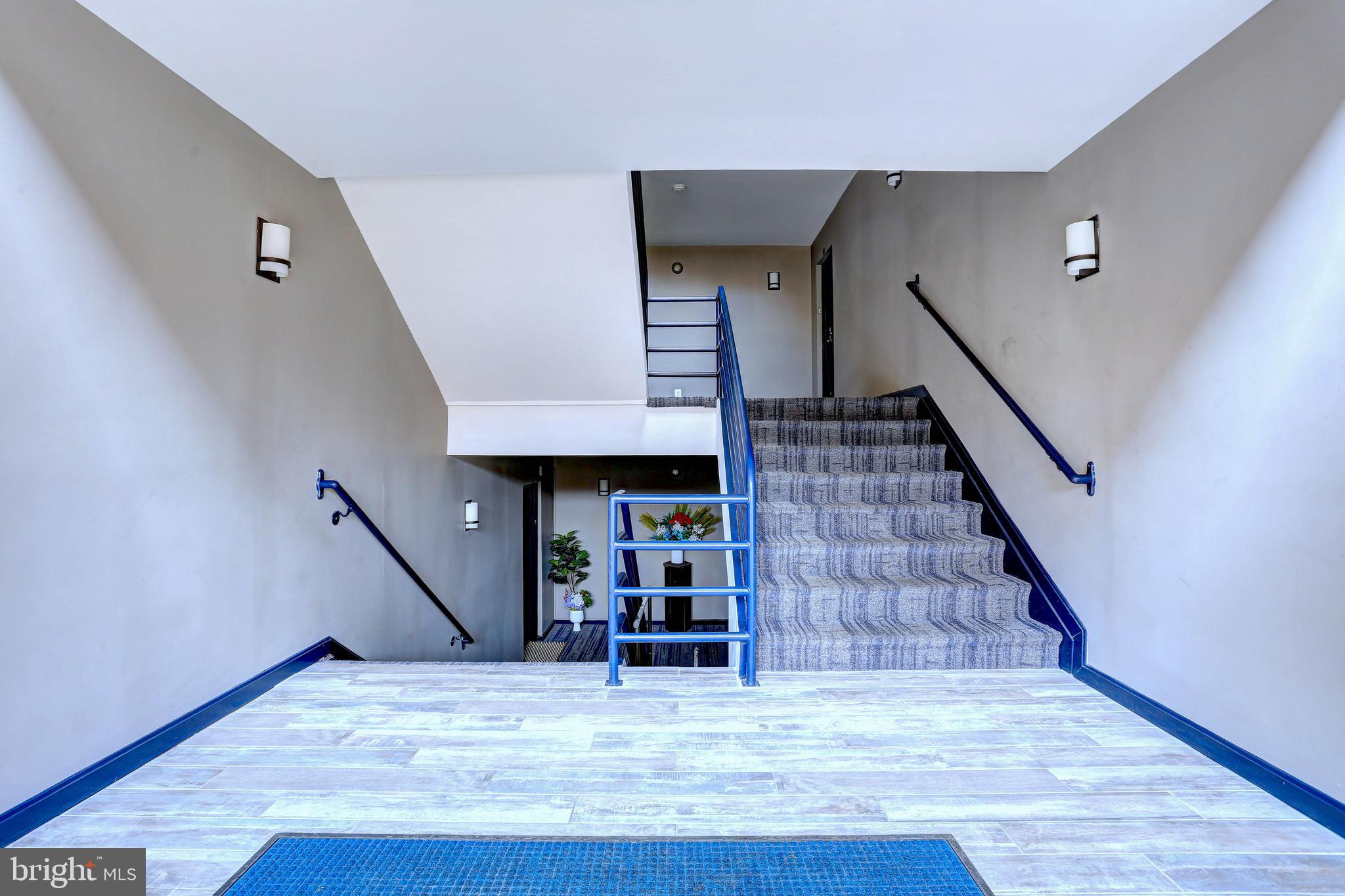 8018 Valley Manor Road, Unit 1A Owings Mills, MD 21117 - Photo 21 of 24 a view of an entryway with wooden floor