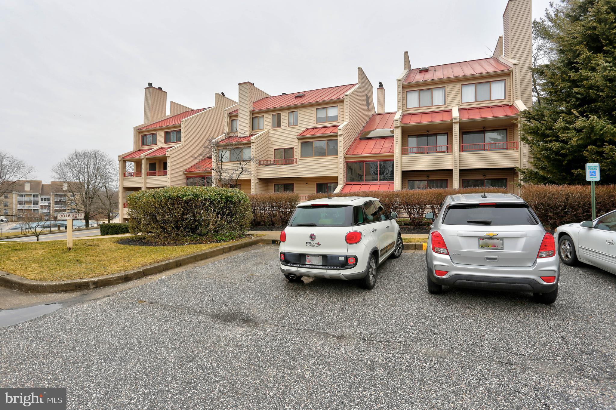 8018 Valley Manor Road, Unit 1A Owings Mills, MD 21117 - Photo 24 of 24 a car parked in front of a building