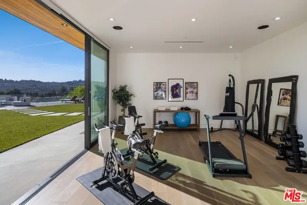 a view of a room with gym equipment