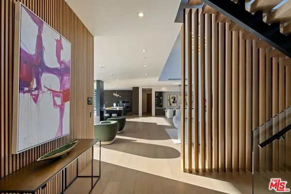 a view of living room with furniture and floor to ceiling window