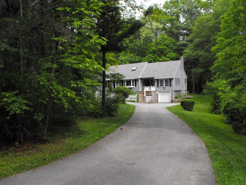 1 West Dale Road Stockbridge, MA 01229 - Photo 1 of 20 a front view of a house with yard and green space