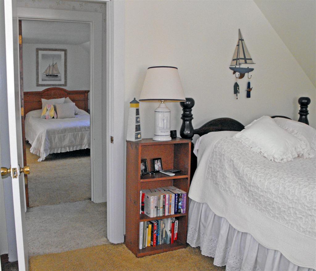1 West Dale Road Stockbridge, MA 01229 - Photo 17 of 20 a bedroom with a bed and a chandelier