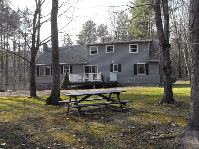 1 West Dale Road Stockbridge, MA 01229 - Photo 7 of 20 a house that has sitting area in front of a house