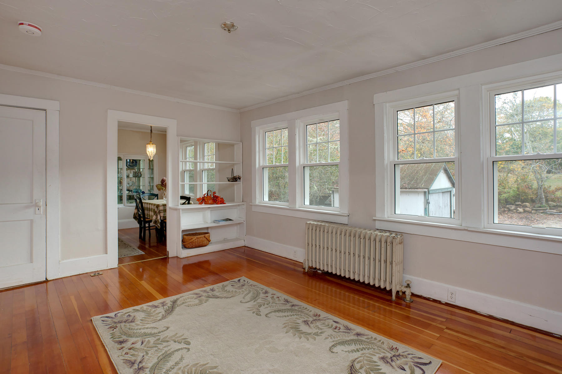 27 County Road Monument Beach, MA 02532 - Photo 5 of 17 a living room with furniture and a window