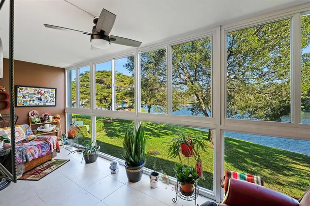 a living room with garden area and furniture