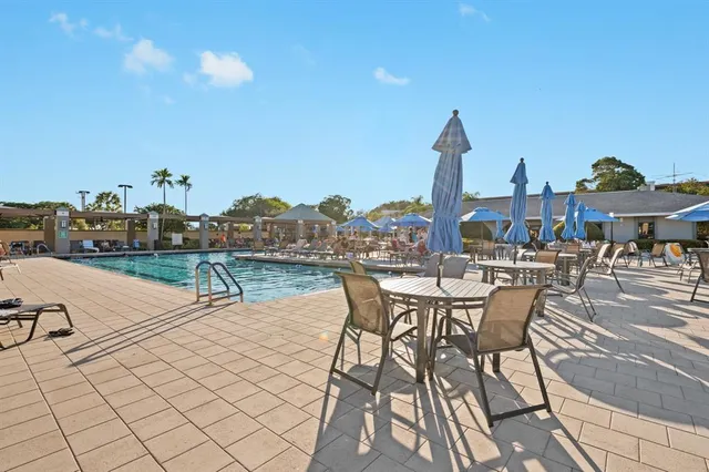 a view of a terrace with furniture