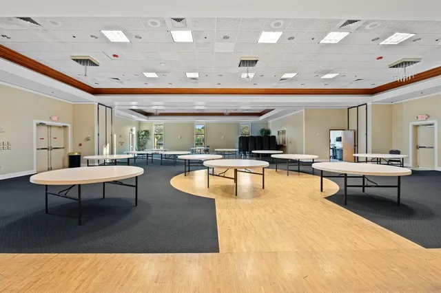 a view of an empty room with a balcony