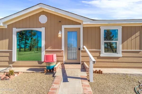 a house view with a outdoor space