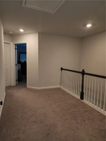 a view of hallway with livingroom