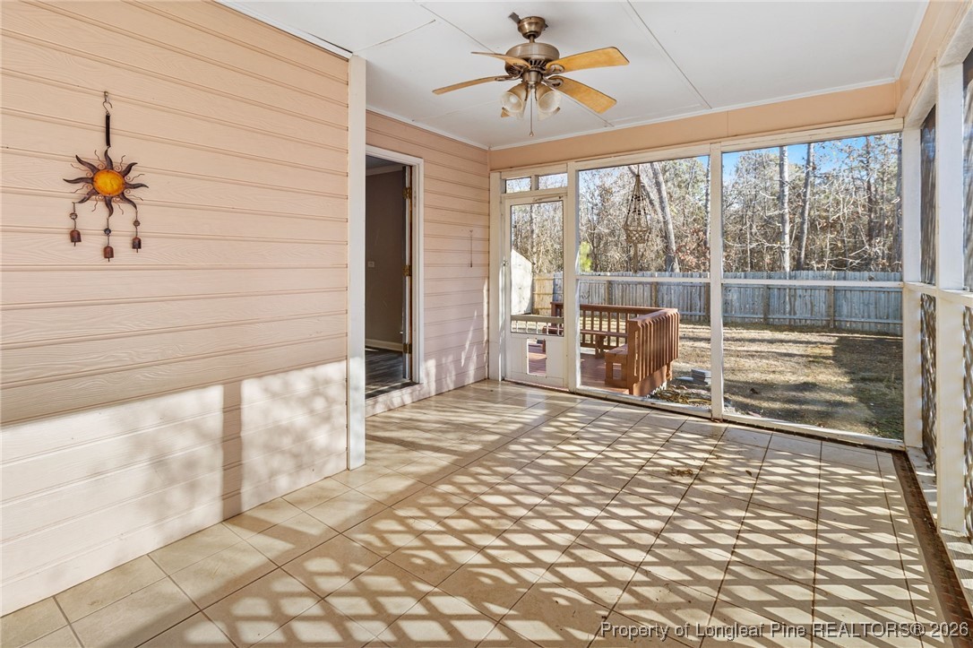 921 Flintwood Road Fayetteville, NC 28314 - Photo 22 of 44 a view of empty room with wooden floor and fan
