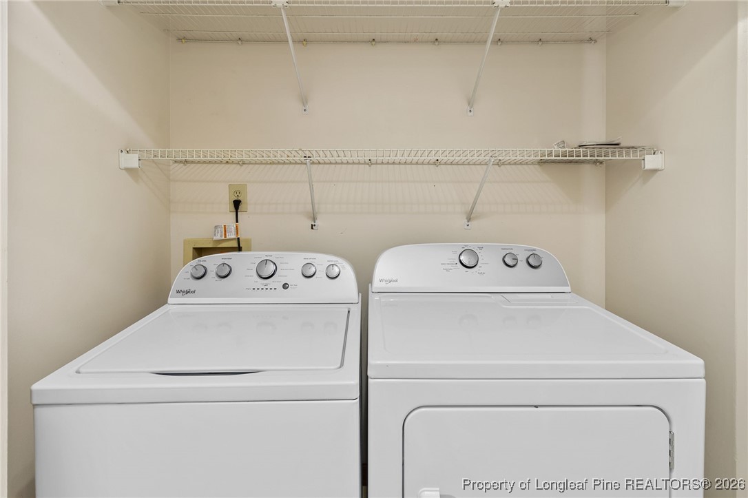 921 Flintwood Road Fayetteville, NC 28314 - Photo 24 of 44 a utility room with dryer and washer