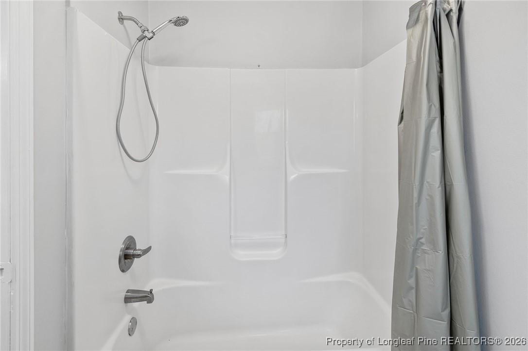 921 Flintwood Road Fayetteville, NC 28314 - Photo 29 of 44 a bathroom with a shower