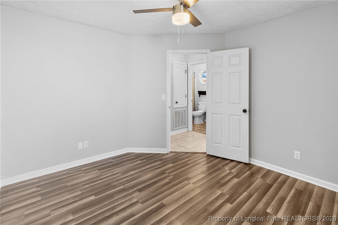 921 Flintwood Road Fayetteville, NC 28314 - Photo 32 of 44 wooden floor in an empty room