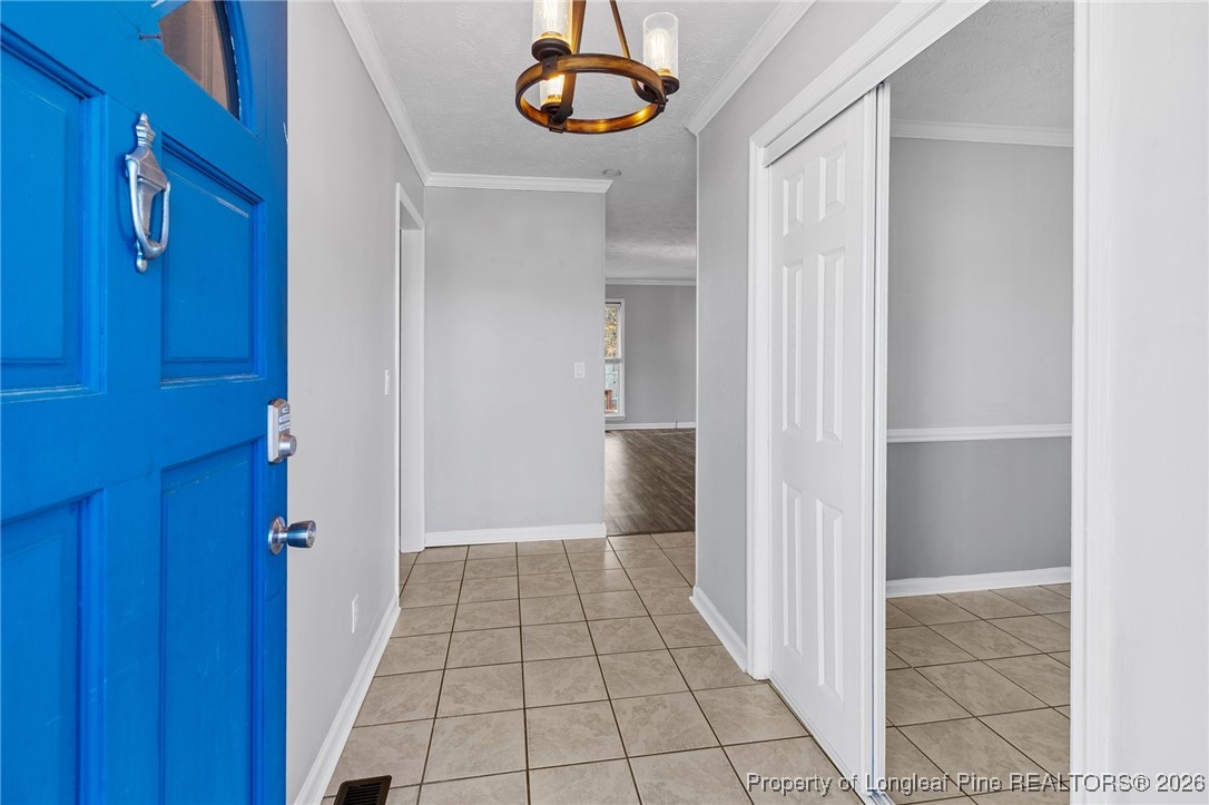 921 Flintwood Road Fayetteville, NC 28314 - Photo 6 of 44 a view of a hallway with front door