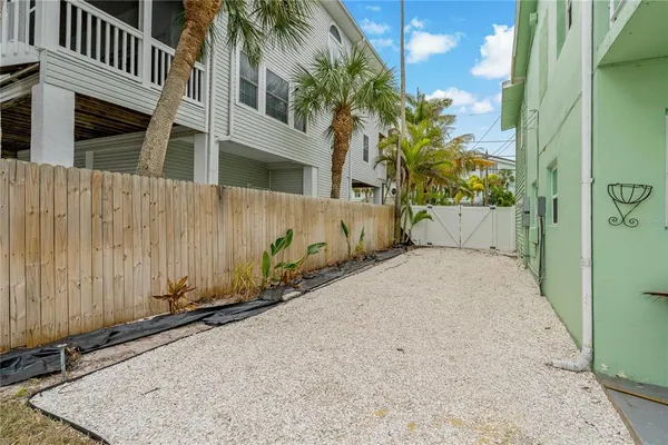 a view of a back yard of the house