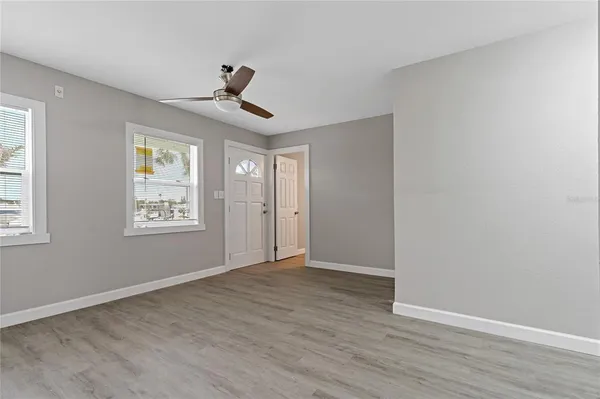 a view of an empty room with a window