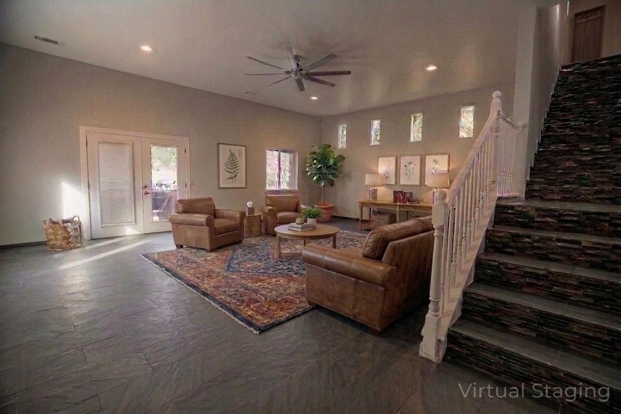 709 Pinewood Way Cave Junction, OR 97523 - Photo 21 of 24 a living room with furniture and a chandelier