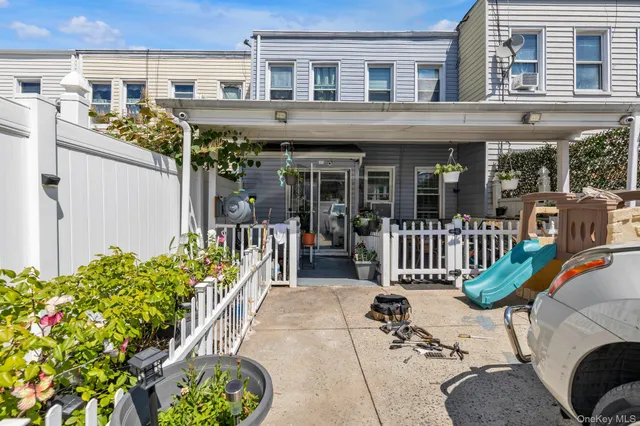 a view of a chairs and table in the patio