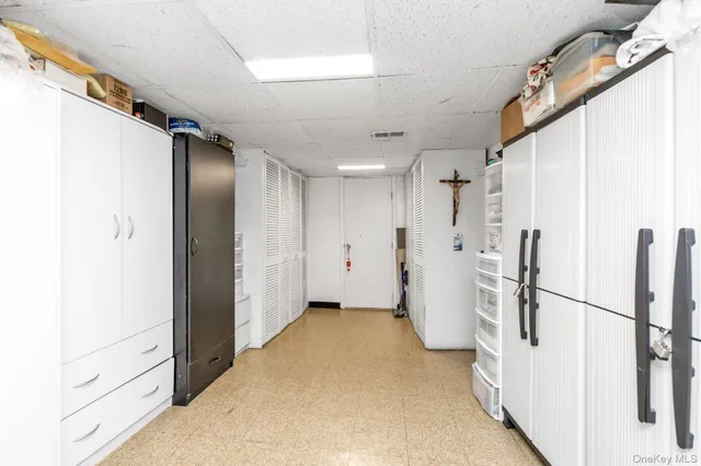 a view of a hallway with white walls
